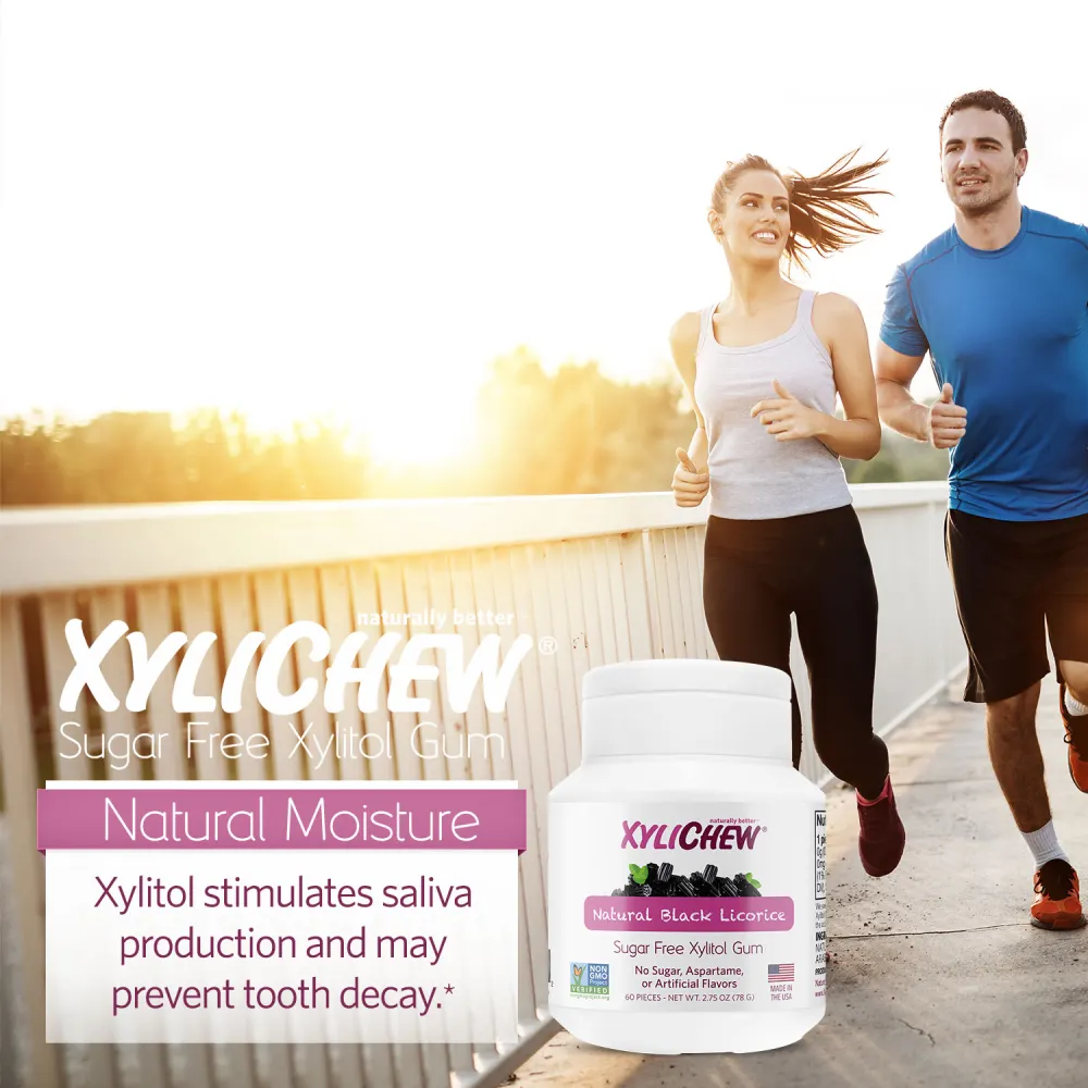 picture of man and woman running at sunset and with the bottle of xylitol Natural Black Licorice chewing gums from Xylichew without aspartam (aspartam free) | For website: healthychewinggum.com | Source: Xylichew