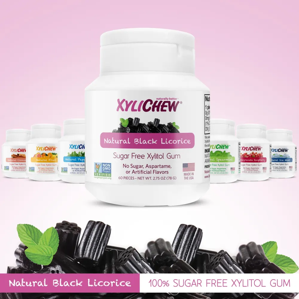 image with multiple flavors of Xylichew xylitol chewing gum in the foreground Natural Balck Licorice flavored xylitol chewing gum without aspartame in a bag of 50 pcs | For website: healthychewinggum.com | Source: Xylichew