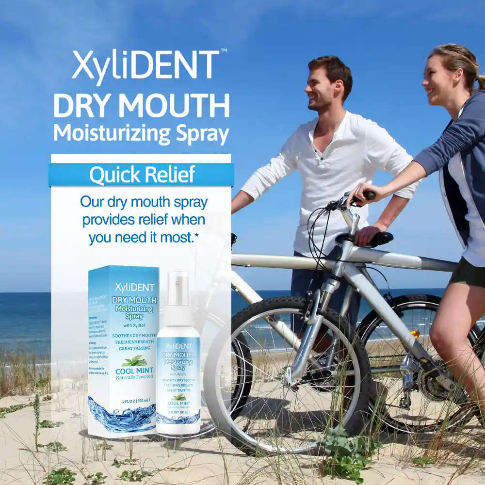 picture of man and woman with bicycles walking by the beach and image of xylitol moisturizing mouth spray for dry mouth by XyliDENT with Cool Mint flavor in bottle 59 ml | For website: healthychewinggum.com | Source: XyliDENT