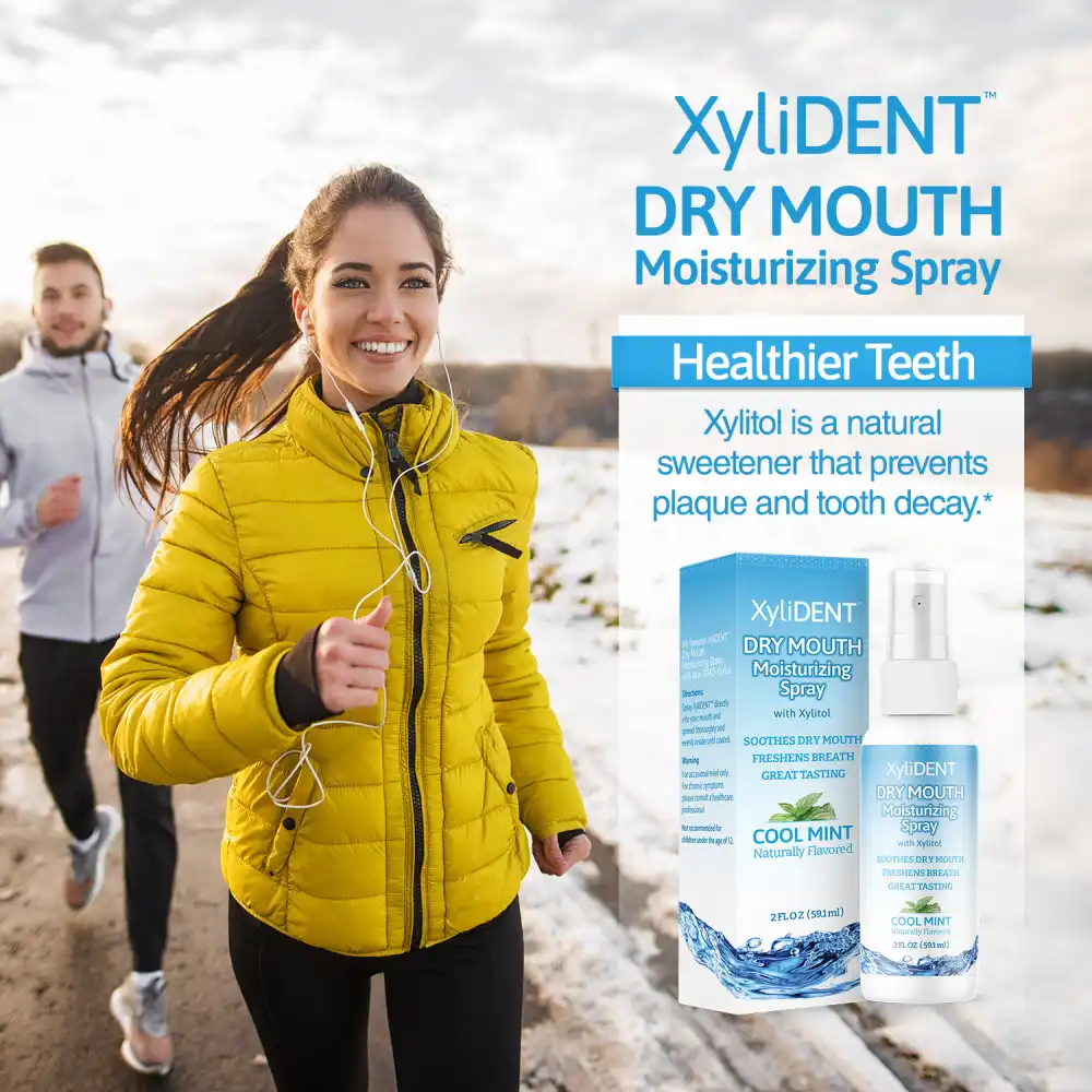 a picture with a man and a woman running on a road in winter and image of xylitol moisturizing mouth spray for dry mouth by XyliDENT with Cool Mint flavor in bottle 59 ml | For website: healthychewinggum.com | Source: XyliDENT