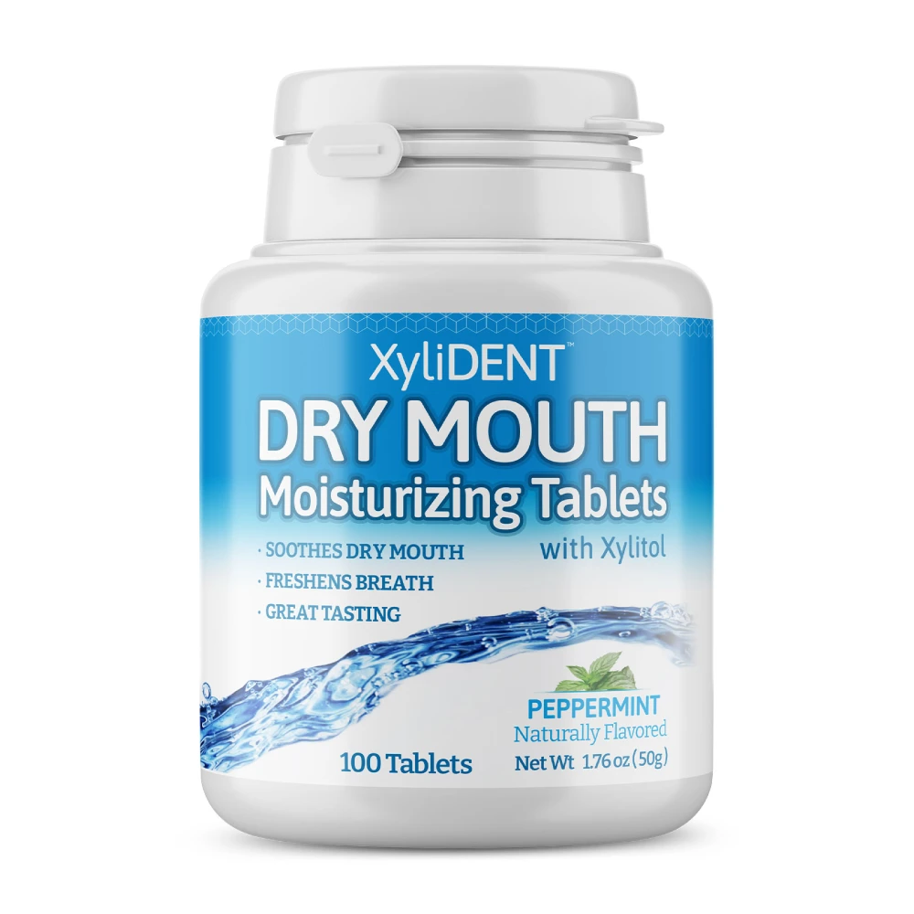 picture with xylitol moisturizing pastilles XyliDENT with Peppermint flavor in a bottle of 100 pieces without aspartame against dry mouth freshens breath | For website: healthychewinggum.com | Source: XyliDENT