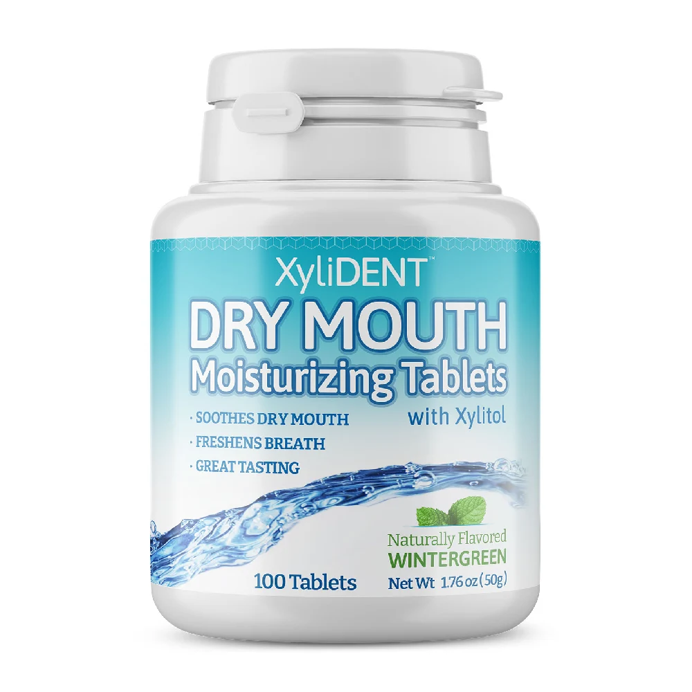 picture with xylitol moisturizing pastilles XyliDENT with Wintergreen flavor in a bottle of 100 pieces without aspartame against dry mouth freshens breath | For website: healthychewinggum.com | Source: XyliDENT