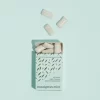 picture of Eucalyptus Mint All Nature Chewing Gum from honest gum spilled out of the flip box from the front with 12 pcs on a blue white background with a box shadow | Plastic free, sugar free, sustainable and aspartam free | For website: healthychewinggum.com | Source: honest gum