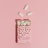 picture of Fruit All Nature Chewing Gum from honest gum spilled out of the flip box from the front with 12 pcs on a pink white background with a box shadow | Plastic free, sugar free, sustainable and aspartam free | For website: healthychewinggum.com | Source: honest gum