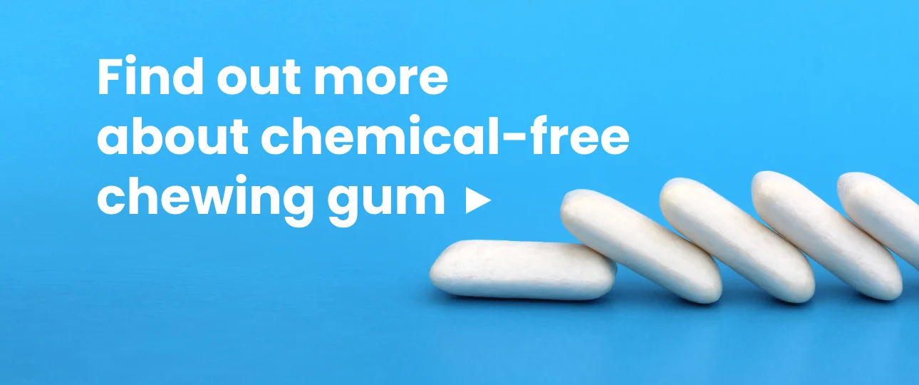 White dragee chewing gum leaning against each other with the one on the left lying down and the rest leaning on it in the right part of the slider and on the left part is the text in bold white letters: "Learn More About Chemical-free Chewing Gum with a blue background highlighting healthy gums | For purposes: slider banners | For mobile phones | For website: HealthyChewingGum.com | Banner author: Jiří Samuel | Photo source: shutterstock.com