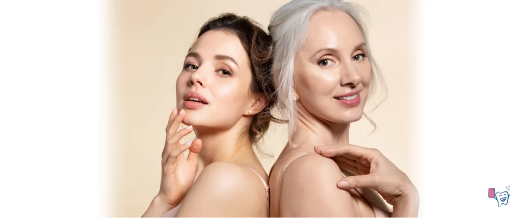 The image shows two women with bright and beautiful skin, standing with their backs touching each other. One of them is younger, while the other on the right side is older woman. | For article: How Does Pure Collagen Benefit Us? | For website: healthychewinggum.com | Source: shutterstock