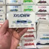 Xylichew ice mint chewing gum in a blister holding in the left hand in the background with other blisters with other flavours